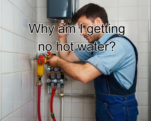plumber repairing hot water system